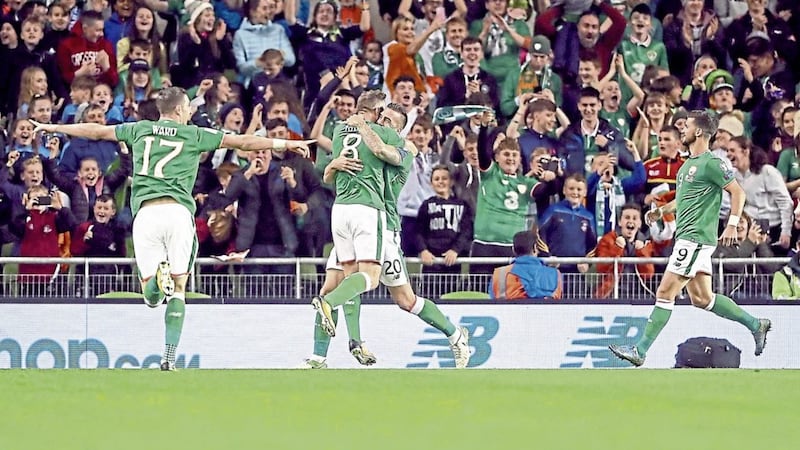 Republic of Ireland&#39;s Daryl Murphy (centre) celebrates scoring his side&#39;s first goal in the win over Moldova at the Aviva Stadium 