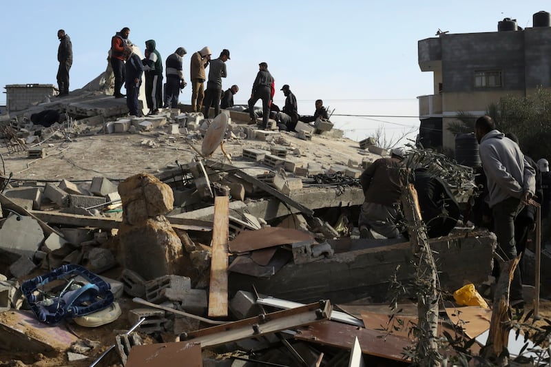 A residential building collapsed after an Israeli air strike in Rafah, Gaza Strip, on Saturday night (Hatem Ali/AP)