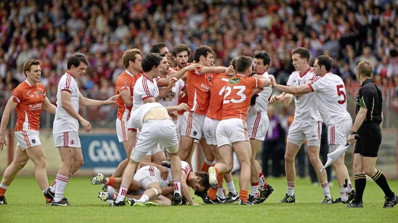 An altercation between Armagh and Tyrone players breaks out in the opening minutes of the All-Ireland SFC Qualifying round two match at&nbsp;Healy Park in July 2014<br />Picture: Barry Cregg/Sportsfile