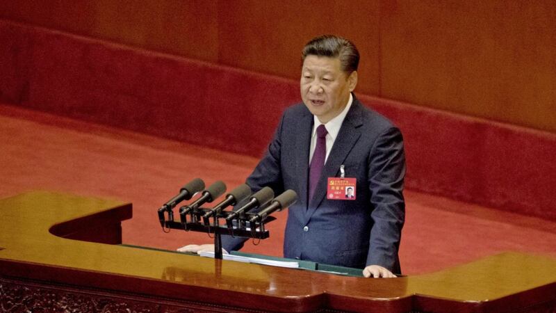 The current dispute over the Irish Sea border is set to be reflected in a much greater struggle for power between the US and China in two other bodies of water: the Indian and Pacific Oceans. Pictured is Chinese President Xi Jinping. AP Photo/Ng Han Guan 