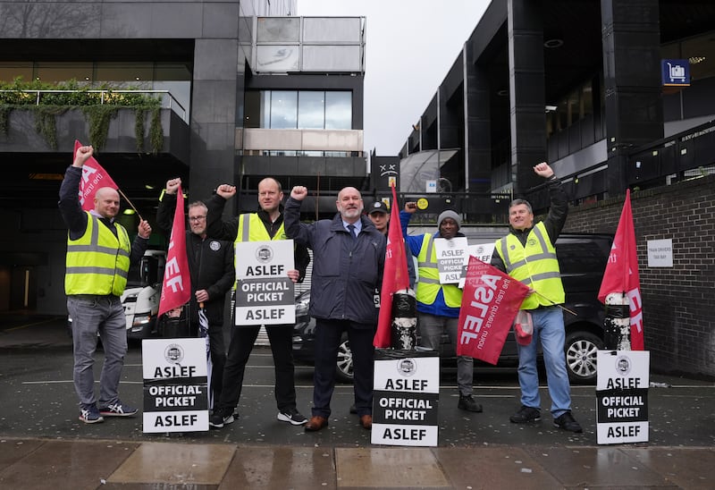 Aslef general secretary Mick Whelan with drivers on the picket line at Euston station
