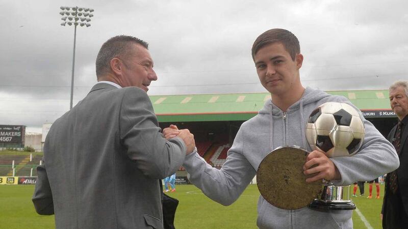 Eddie Patterson with Jordan Stewart, whose departure to Swindon Town a fortnight ago has come as a blow to the Glens 