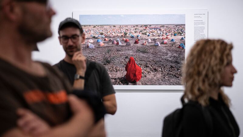 Jonathan Fointaine’s The Nomad’s Final Journey, which was awarded with an honourable mention by the World Press Photo jury, at the opening of the World Press Photo 2023 exhibition at the Hungarian National Museum, in Budapest (Szigetvary Zsolt/MTI/AP)
