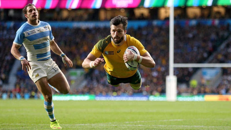 Australia&#39;s Adam Ashley-Cooper scores his second try during the Rugby World Cup semi final against Argentina 