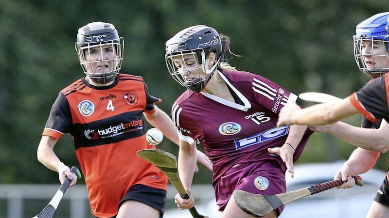 Slaughtneil&#39;S Sinead Mellon is challenged by Ciara Mullan of Lavey in the Derry Senior Camogie Championship semi-final match at Foreglen on Saturday Picture: Margaret McLaughlin. 