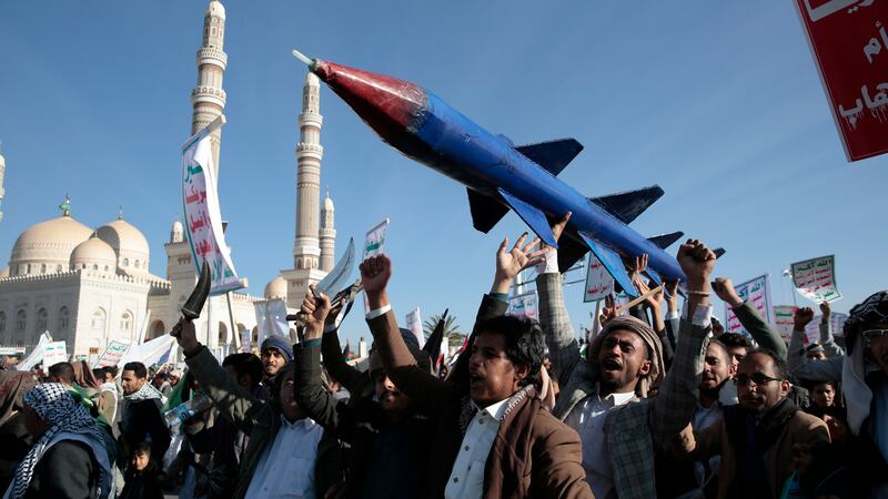 Houthi supporters attend a rally in support of the Palestinians and against the air strikes on Yemen (Osamah Abdulrahman/AP)