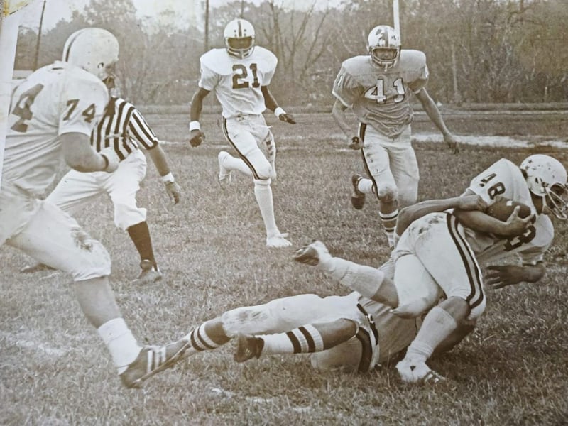 A young Sherman Hall, wearing number 21, in action for Knoxville College 