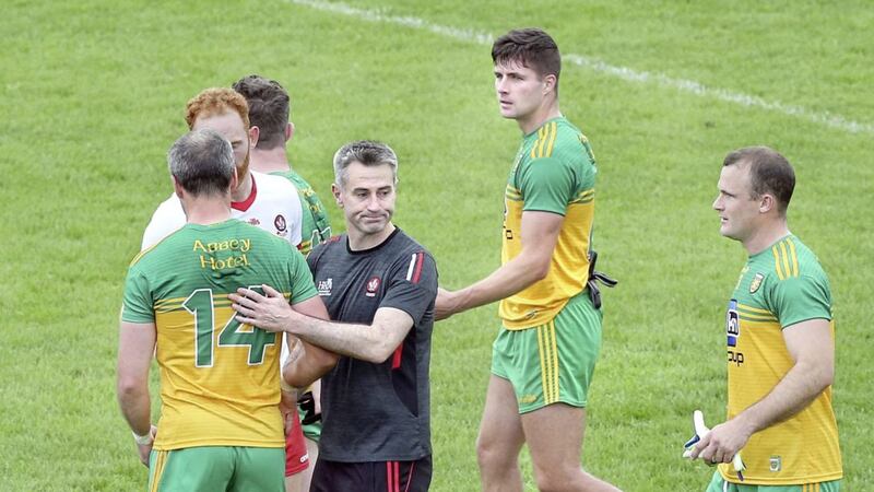 Derry manager Rory Gallagher congratulates Michael Murphy after last summer&#39;s Ulster clash Picture Margaret McLaughlin. 