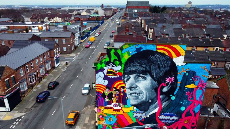 A mural of Ringo Starr has gone up on The Empress pub building near the former Beatle’s childhood home in Liverpool.