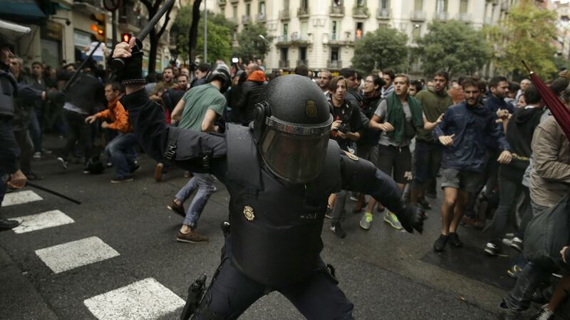 Violent clashes are taking place in Barcelona and other areas of the Spanish region as would-be voters face off against police.