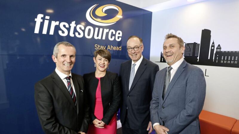 Pictured at the new Firstsource Solutions Belfast office are: Sean Canning, Firstsource Solutions; Laura Hourican, Firstsource Solutions; Mark Slaughter, director general for investment, Department for International Trade; and Kieran Long, Firstsource Solutions. 