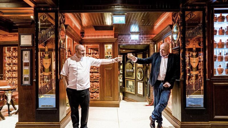 Niall McKenna (left) and Willie Jack (right) in the new &pound;2m extension of The Friend At Hand Irish whiskey museum and emporium. Pictures by Elaine Hill 