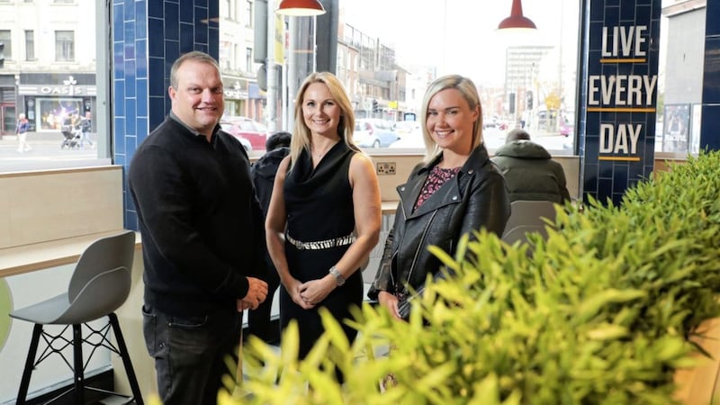 Danske Bank business manager Michelle Wilson (centre) with Centra franchise owners Ricky and Vicky Leathem. Photo: Kelvin Boyes/PressEye 
