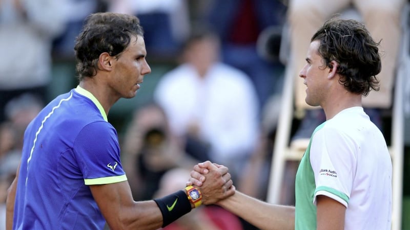 Spain&#39;s Rafael Nadal (left) shakes hands with Austria&#39;s Dominic Thiem after their semi-final match of the French Open tennis tournament at the Roland Garros stadium in Paris. Nadal won 6-3, 6-4, 6-0. (AP Photo/David Vincent) 