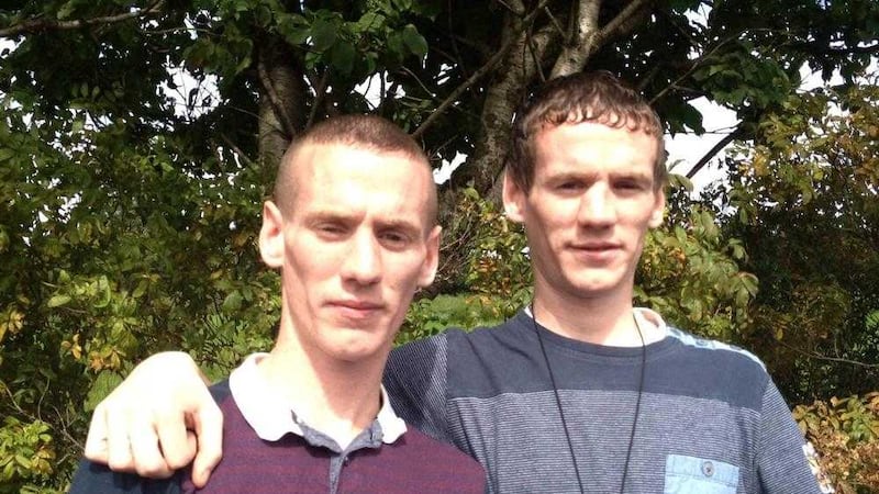 Murder victim Gerard Quinn (left) with his twin brother Michael 