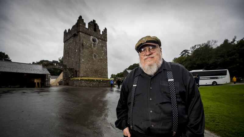 George RR Martin was visiting Northern Ireland where much of the filming took place.
