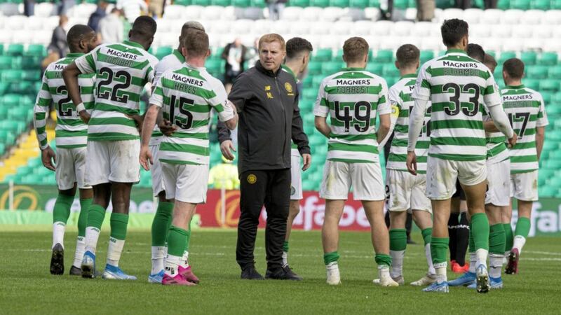 Celtic manager Neil Lennon speaks to his players after Saturday&#39;s Betfred Cup win over Dunfermline at Celtic Park. The Bhoys face AIK Stockholm tonight. Picture by PA 