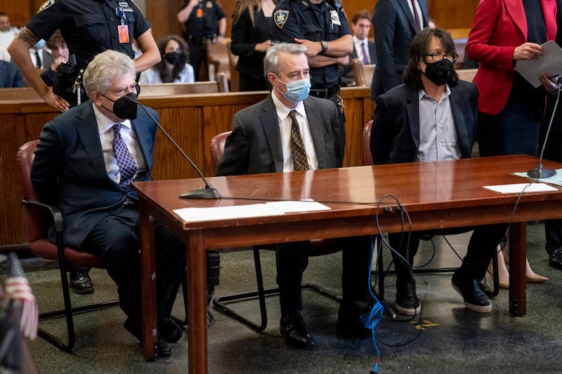 From left, Glenn Horowitz, Craig Inciardi, and Edward Kosinski appear in criminal court after being indicted for conspiracy involving handwritten notes from the famous Eagles album Hotel California