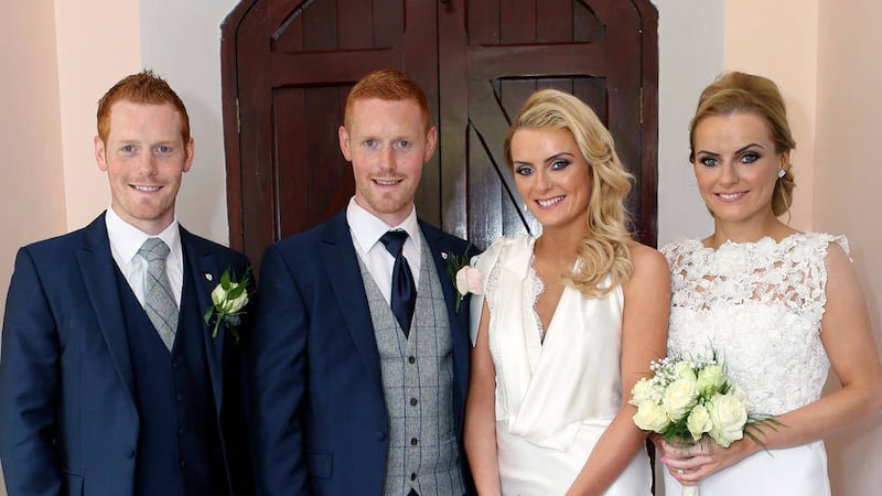 Newlyweds Karol Dolan and Kirsty Gormley with their identical twins Caolan and Stacey. Picture by McLaren Photography 