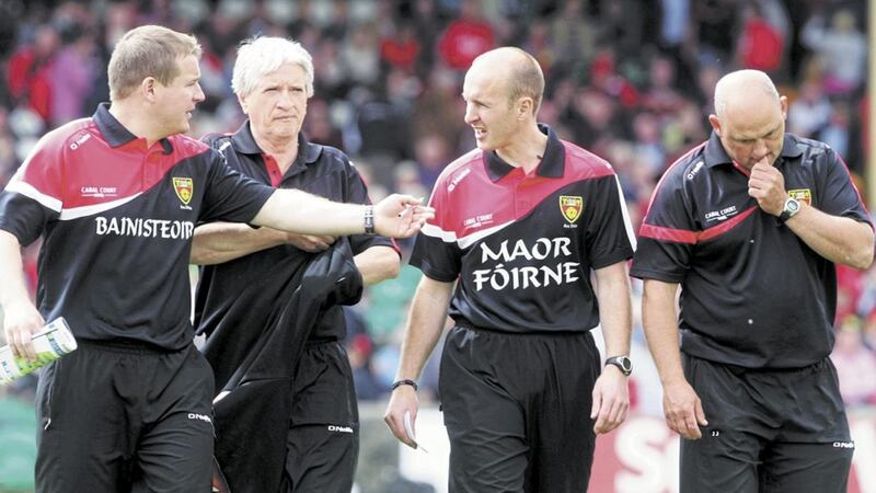 Paddy Tally with Down manager James McCartan (left) and Brian McIvor during the Mournemen&#39;s successful 2010 campaign 