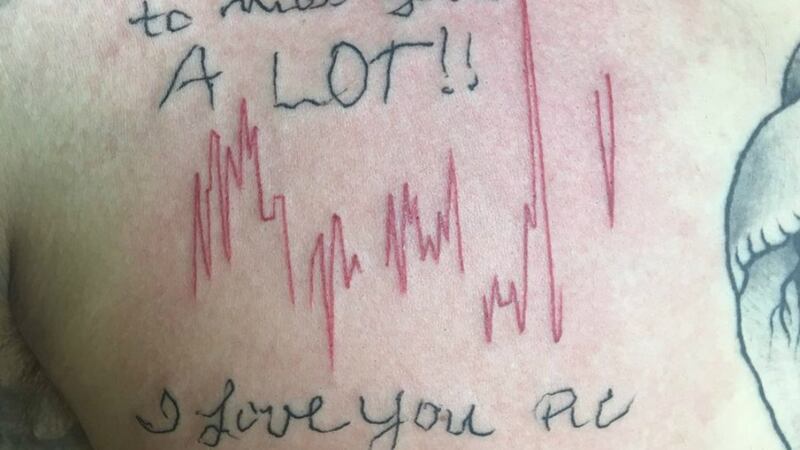 Thomas Resch also got a note she had written to him tattooed in her handwriting.