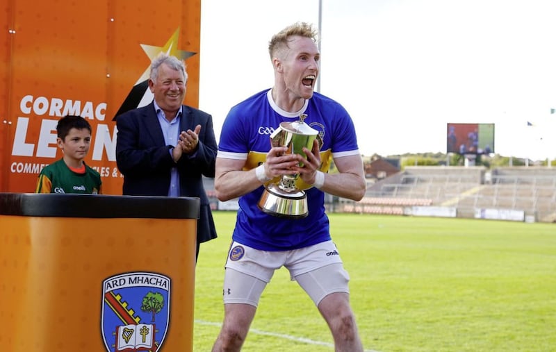 Maghery&#39;s captain David Lavery celebrates lifting the Gerry Fegan Cup in the Athletic Grounds after victory over Crossmaglen. Picture by Seamus Loughran 