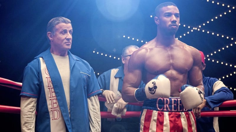 Sylvester Stallone as Rocky Balboa and Michael B Jordan as Adonis Creed in Creed II 