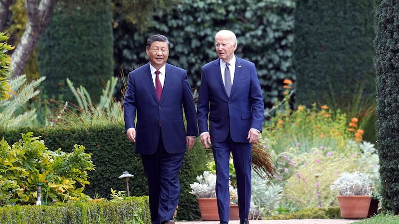 President Joe Biden and China’s President President Xi Jinping walk in the gardens at the Filoli Estate in California (Doug Mills/The New York Times/APl)