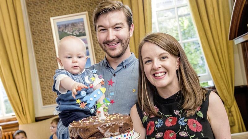 Belfast mayor, Nuala McAllister was 27 when she had her first child, Finn last August. Nuala is pictured with her partner, Sam Nelson and son, Finn 