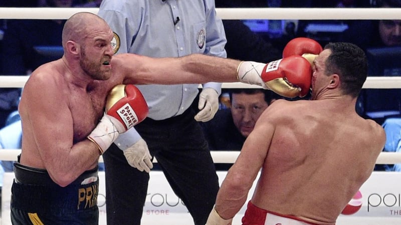 Tyson Fury lands a shot on Wladimir Klitschko during their clash in November 2015. Fury won the fight on points