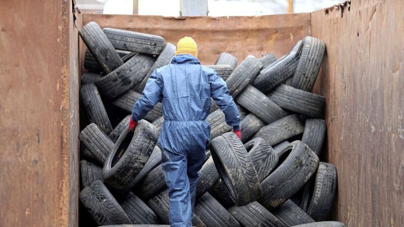 Tyres and other bonfire material being removed from the Connswater Greenway in east Belfast&nbsp;