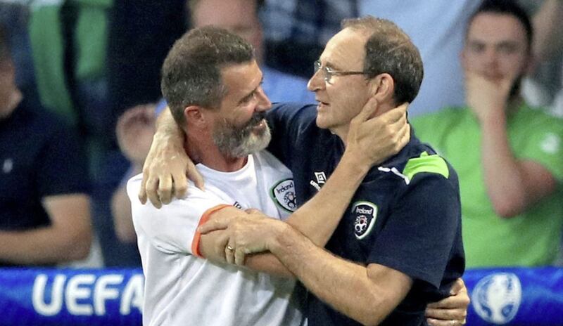 Republic of Ireland manager Martin O'Neill and his assistant Roy Keane celebrate qualifying for the round-of-16 at Euro 2016