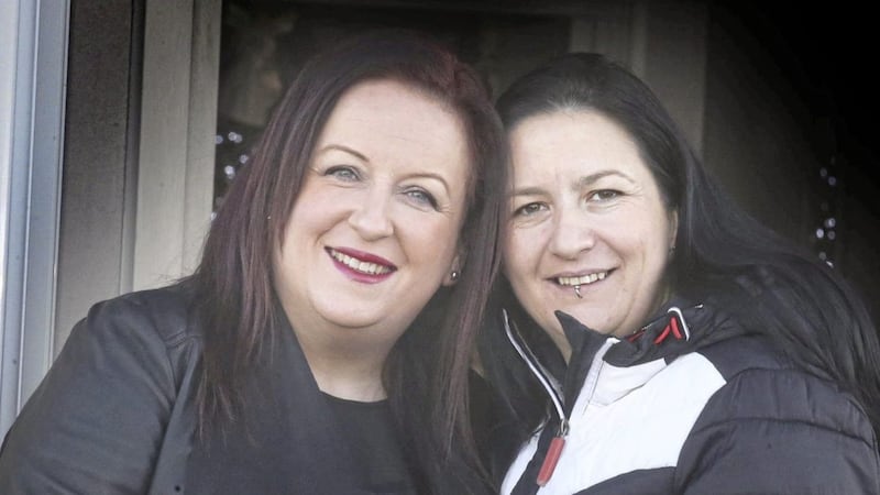 Cara McCann (left) and Amanda McGurk are among 17 same-sex couples who will today convert their civil partnership into marriage following the introduction of new legislation in Northern Ireland. Picture by Hugh Russell. 