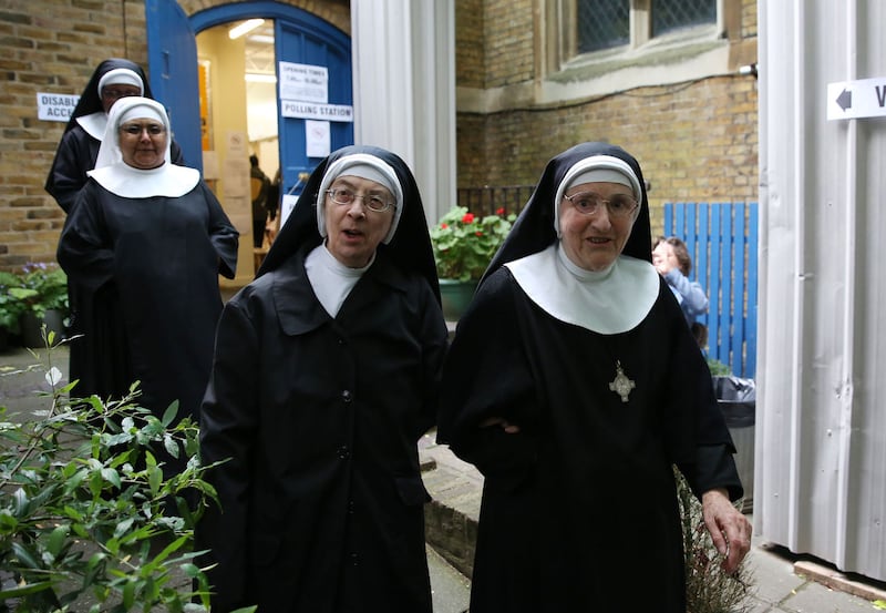 &nbsp;<span style="font-family: Verdana, Arial, Helvetica, sans-serif; font-size: 13.3333px;">Nuns from Tyburn Convent leave a polling station at St John's Parish Hall, central London, after casting their votes in the General Election.</span><span style="font-family: Verdana, Arial, Helvetica, sans-serif; font-size: 13.3333px;">&nbsp;</span><span style="font-family: Verdana, Arial, Helvetica, sans-serif; font-size: 13.3333px;">&nbsp;Isabel Infantes/PA Wire</span>