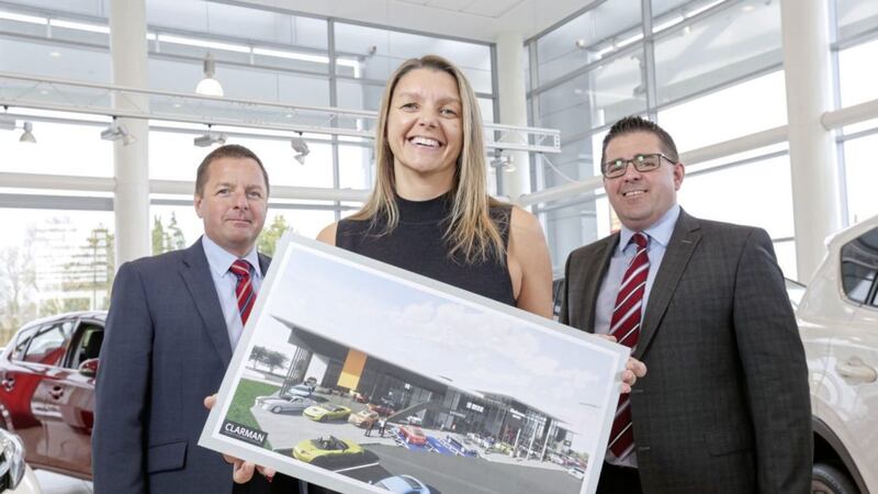 Pictured unveiling plans for the new Shelbourne Motors complex in Newry are the company&#39;s sales directors Richard Ward (left) and Paul Ward, and finance director Caroline Willis 