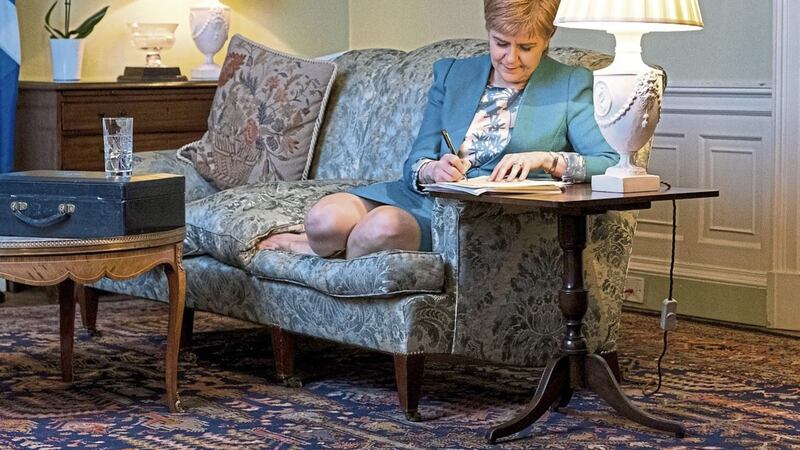 Scottish First Minister Nicola Sturgeon in the Drawing Room in Bute House, Edinburgh, working on the final draft of her Section 30 letter to the Prime Minister Theresa May formally requesting a second Scottish independence referendum PICTURE: Scottish government/PA 