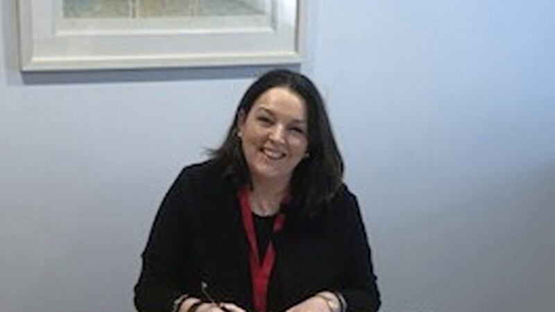 Tina McKenzie, group managing director for Staffline in Ireland, signs the deal purchasing a recruitment firm in North Dublin 