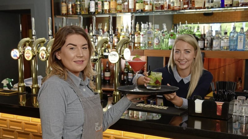 The Cardan in Lisburn has announced plans to hire as many as 15 new staff. Pictured are Gemma Kidd (right), manager of The Cardan Bar &amp; Grill, Lisburn and Eimear McCullough, waitress 