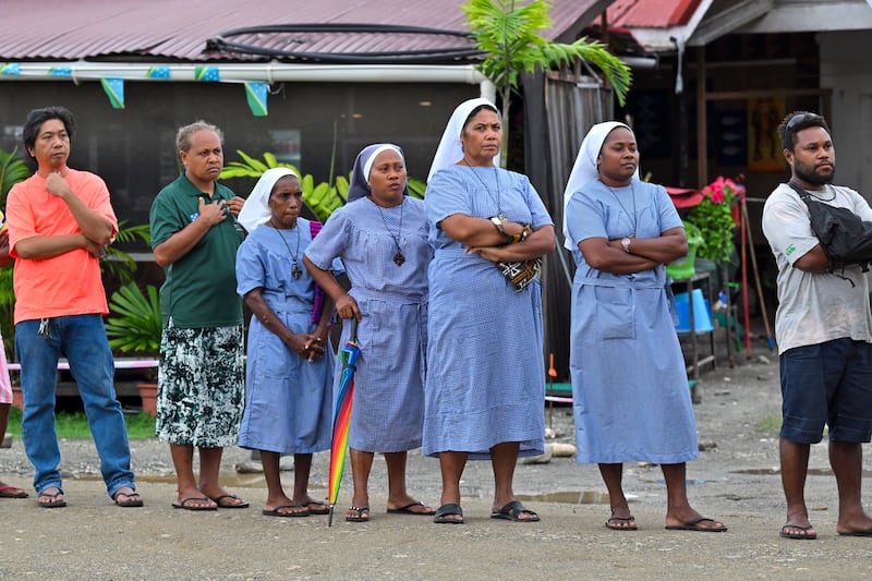 Nuns queue at a polling station in the Solomon Islands’ capital, Honiara (Mick Tsikas/AAP/AP)
