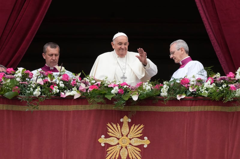 Pope Francis waves to the faithful gathered in St Peter’s Square (Andrew Medichini/AP)
