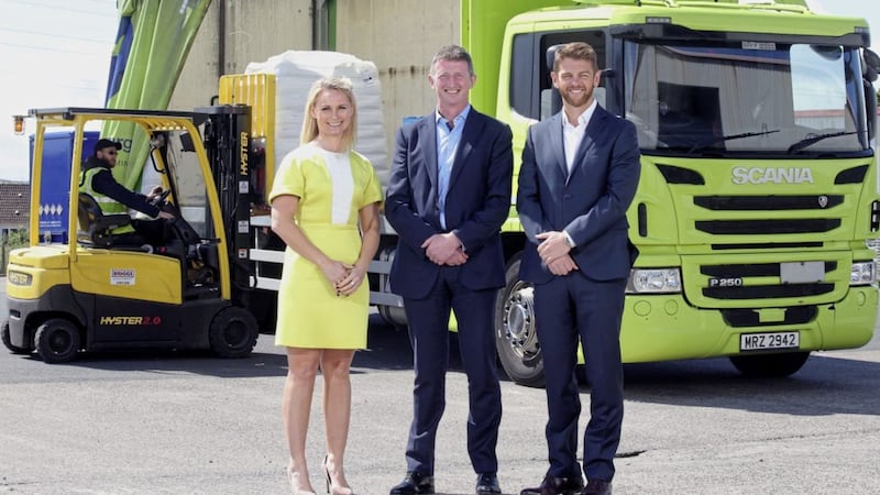 Michelle Wilson, business manager and Robert McCullough, head of Belfast Business Centre at Danske Bank with Mark Adamson, managing director of Asap Cargo 
