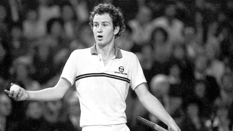 John McEnroe voices his opinions during a tennis match against fellow American Jimmy Connors at London&#39;s Wembley Arena in 1981. 