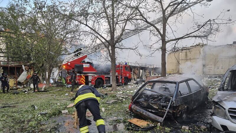 Emergency services at the scene of a Russian attack in Cherkasy (Ukrainian Emergency Service/AP)