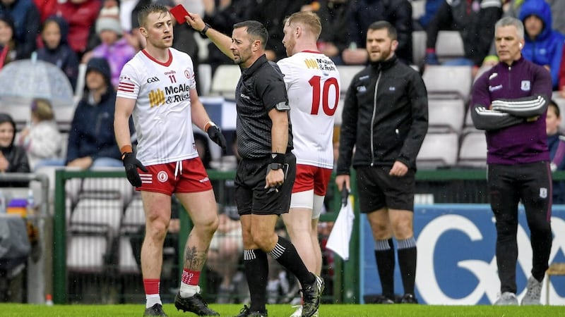 Referee David Gough shows a red card to Frank Burns during Tyrone's defeat to Galway in the first round of the All-Ireland SFC group games at Pearse Stadium on May 21
