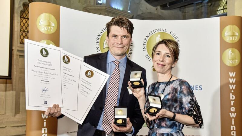 Greg MacNeice of MacIvors Cider Co and his wife Ali celebrating three gold medals in the International Brewing and Cider Awards in London 