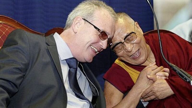 Richard Moore, director of Children in Crossfire and His Holiness the 14th Dalai Lama of Tibet. The Dalai Lama will return to Derry on September 10 to celebrate the charity&#39;s 20th anniversary. 