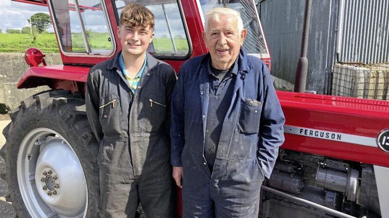 Johnny McGuigan (88) and Jamie Doherty (16) are separated by seven decades in age but united in their love of the Massey Ferguson tractor. 