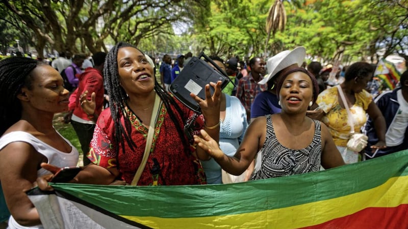 Zimbabweans gather to pray for the country in a park opposite the parliament building in Harare Picture: Ben Curtis/AP 