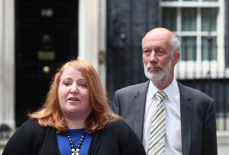 Naomi Long and David Ford from the Alliance Party speak to the media after talks in 10 Downing Street, London. Picture from Gareth Fuller/PA Wire.