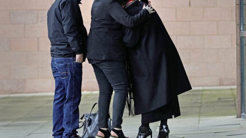 A woman is comforted outside Preston Crown Court after the jury failed to reach a majority verdict. Picture by Aaron Chown/PA